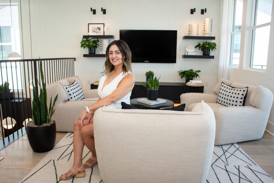 horizontal marie loft sitting on edge of chari